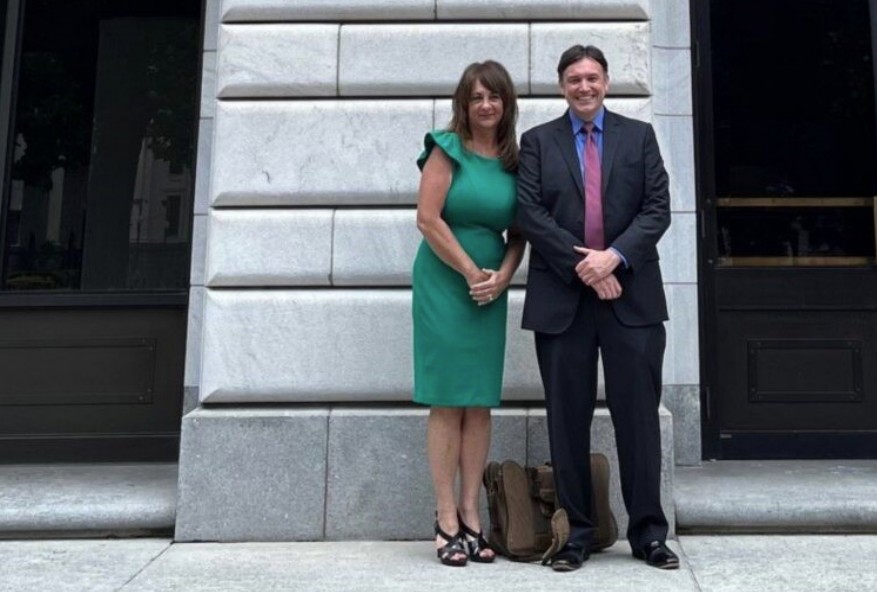 flight attendant Charlene Carter standing with Right to Work attorney Matthew Gilliam