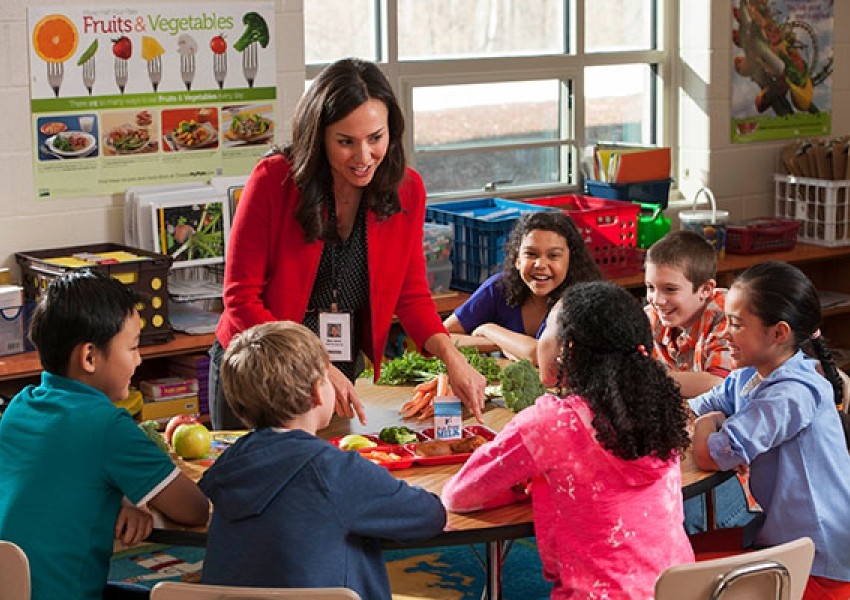 A teacher with students